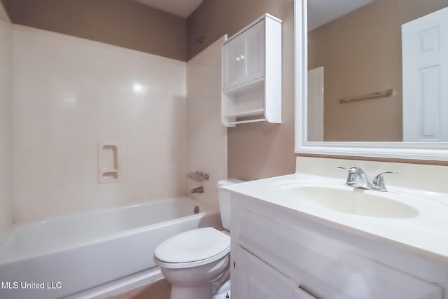 full bathroom featuring bathtub / shower combination, vanity, and toilet