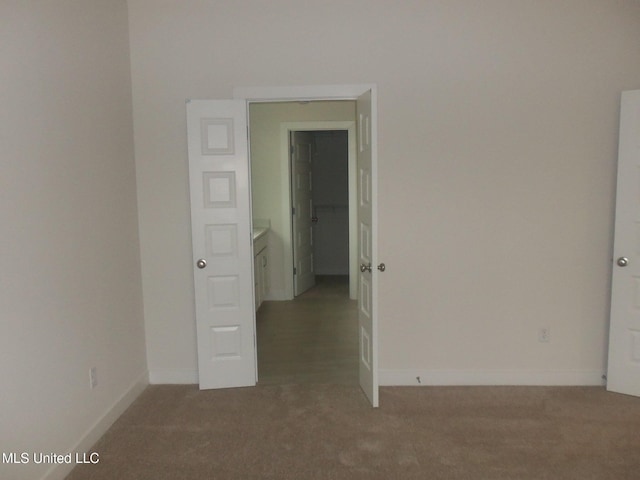 empty room featuring carpet floors