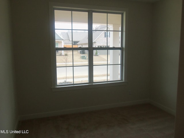 view of carpeted spare room