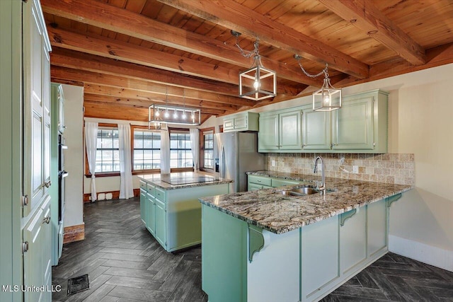 kitchen featuring kitchen peninsula, sink, beam ceiling, a kitchen island, and hanging light fixtures