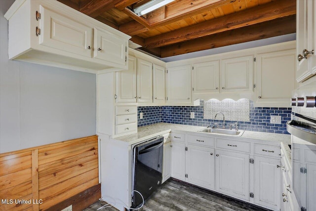 kitchen featuring tasteful backsplash, a skylight, sink, beam ceiling, and dishwasher