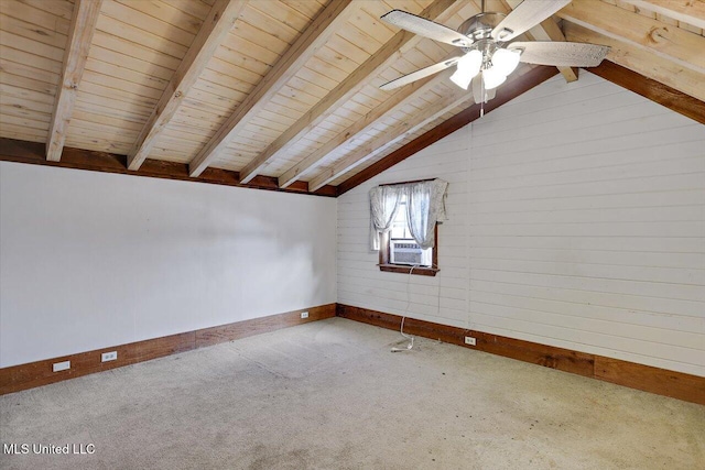 bonus room with carpet flooring, ceiling fan, vaulted ceiling with beams, and wooden ceiling