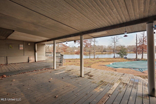 wooden deck with a water view