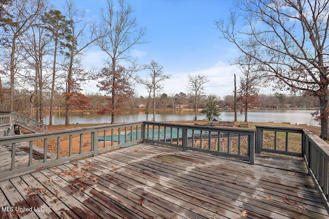 deck featuring a water view