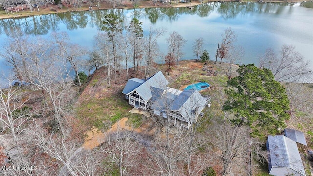 birds eye view of property featuring a water view