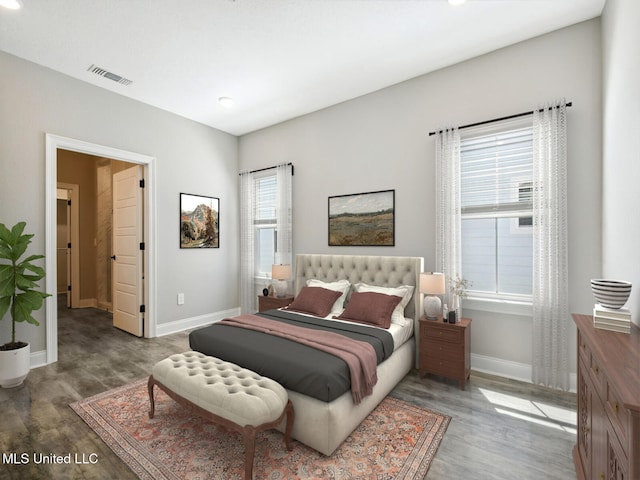130 Everly Cir, Ocean Springs, MS 39564 - bedroom with dark wood finished floors, visible vents, and baseboards