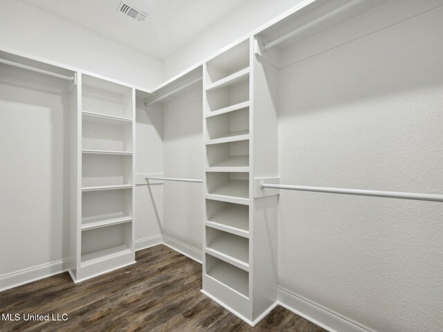 130 Everly Cir, Ocean Springs, MS 39564 - spacious closet featuring dark wood-type flooring and visible vents