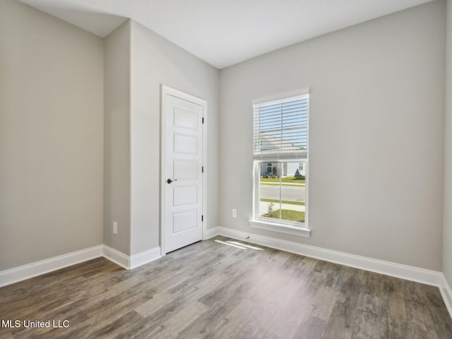 130 Everly Cir, Ocean Springs, MS 39564 - unfurnished room featuring baseboards and wood finished floors