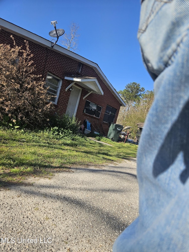 8800 Graham Rd, Moss Point, MS 39562 - view of home's exterior featuring brick siding