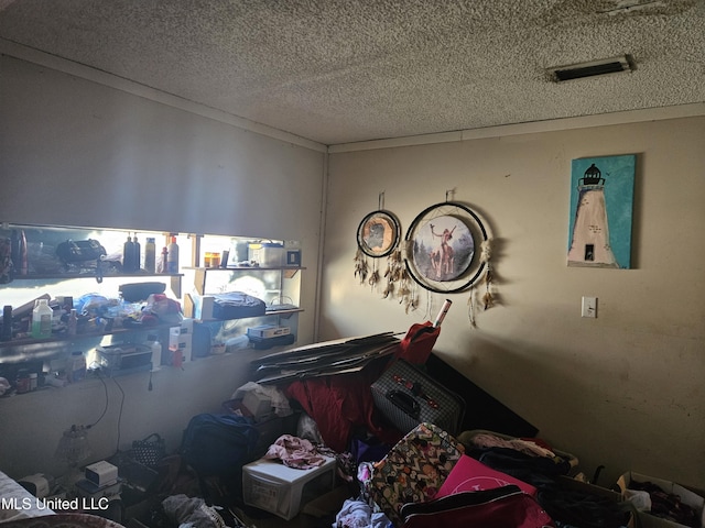 8800 Graham Rd, Moss Point, MS 39562 - bedroom with a textured ceiling