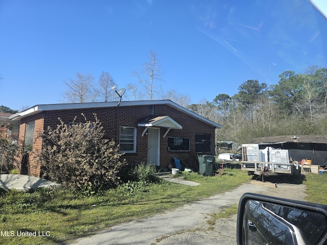 8800 Graham Rd, Moss Point, MS 39562 - view of front facade featuring brick siding