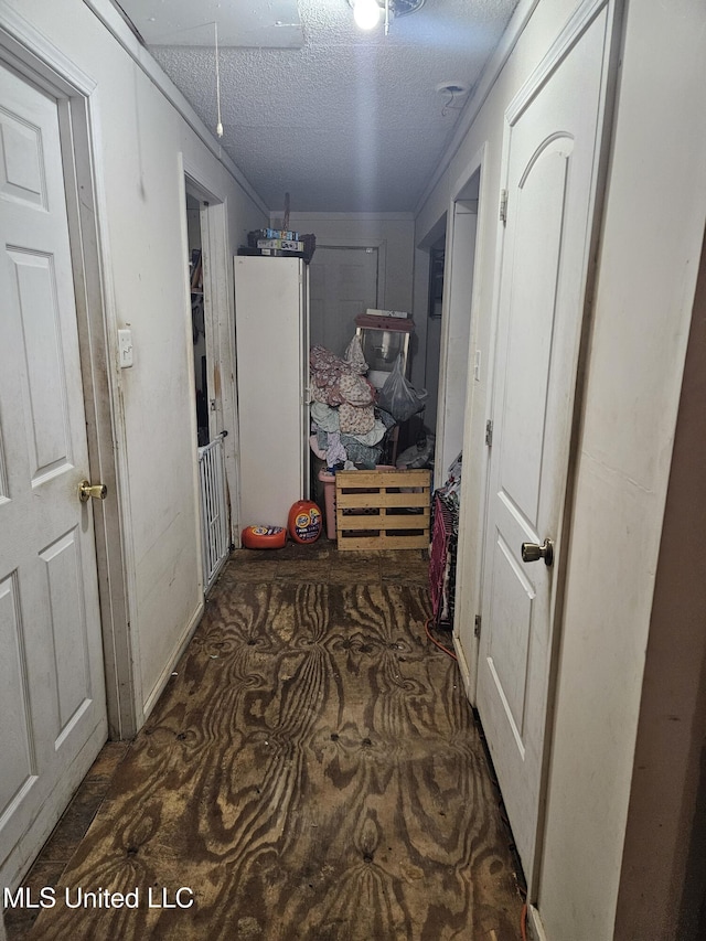 8800 Graham Rd, Moss Point, MS 39562 - hall with attic access and a textured ceiling