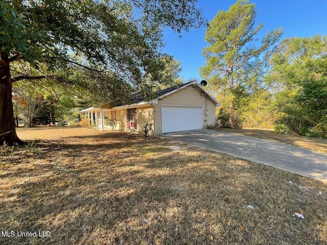 ranch-style home with a garage