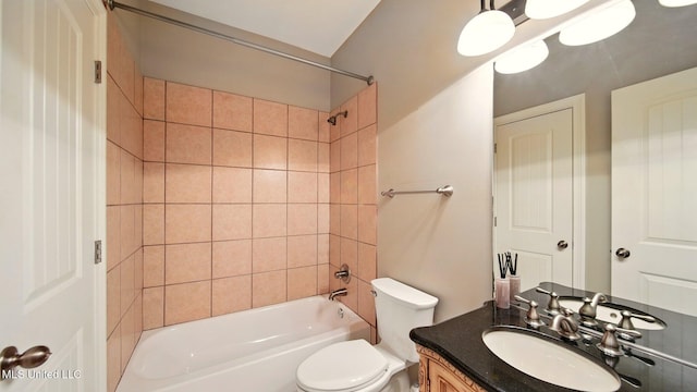 full bathroom featuring shower / bathtub combination, toilet, and vanity