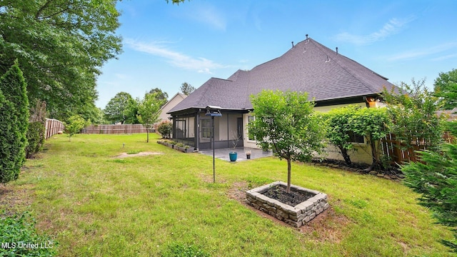 view of yard featuring a sunroom