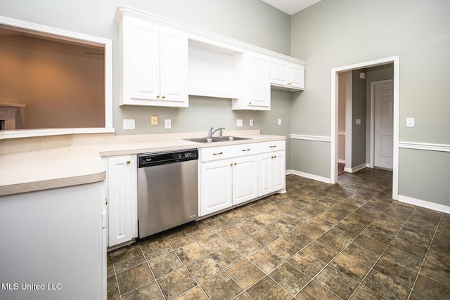 kitchen featuring white cabinetry, sink, and stainless steel dishwasher