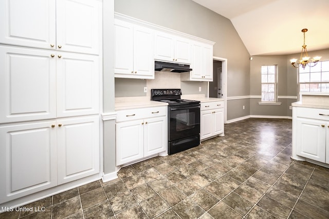 kitchen with black range with electric stovetop, white cabinetry, an inviting chandelier, pendant lighting, and vaulted ceiling