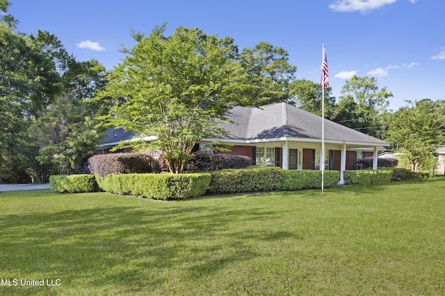 exterior space with a lawn