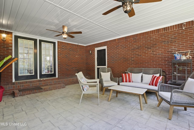 view of patio / terrace with a ceiling fan and outdoor lounge area