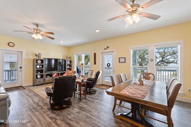 dining room with wood-type flooring and ceiling fan