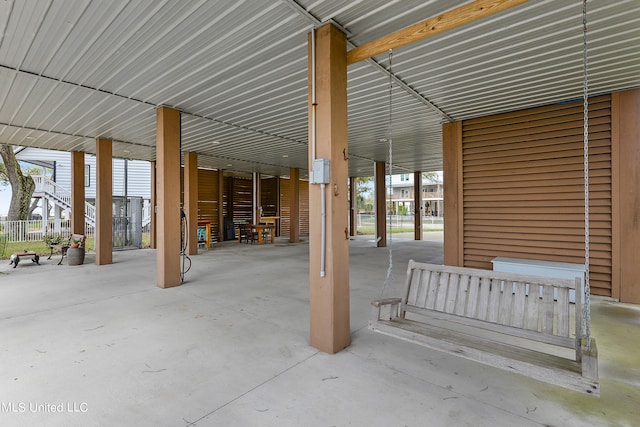 view of patio / terrace featuring a carport