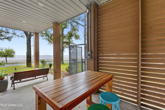 view of patio / terrace featuring a water view