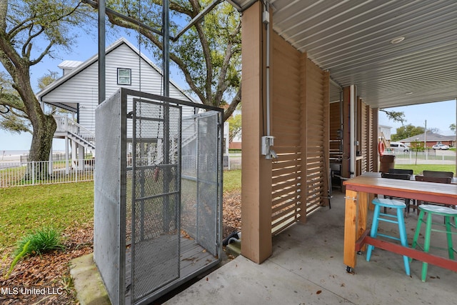 view of outdoor structure with a lawn