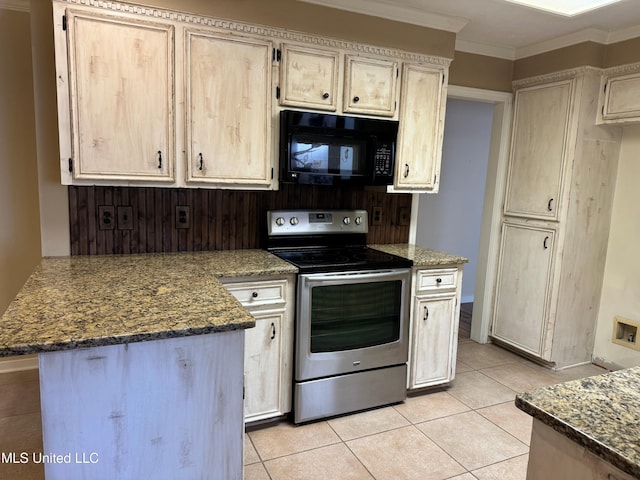 kitchen with crown molding, light tile patterned floors, black microwave, a peninsula, and stainless steel electric range