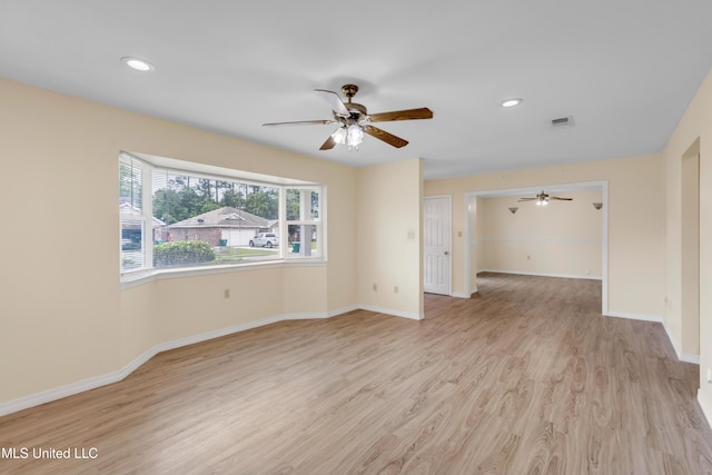 unfurnished room with baseboards, recessed lighting, ceiling fan, and wood finished floors