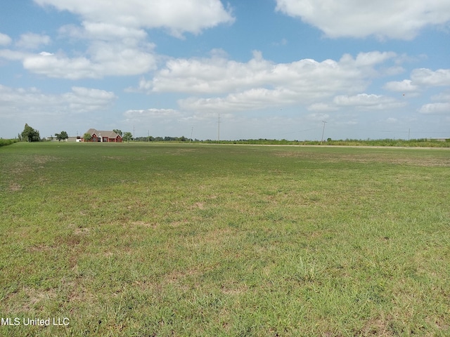 496 Cleveland Crossing Rd, Cleveland, MS 38732 - view of green lawn with a rural view