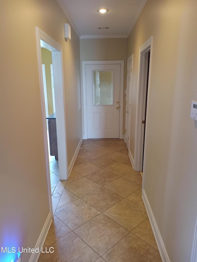 496 Cleveland Crossing Rd, Cleveland, MS 38732 - corridor featuring crown molding, baseboards, and light tile patterned floors