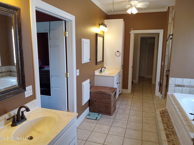 496 Cleveland Crossing Rd, Cleveland, MS 38732 - bathroom with crown molding, tile patterned flooring, a garden tub, ceiling fan, and two vanities