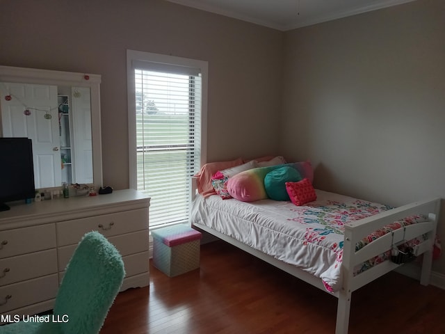 496 Cleveland Crossing Rd, Cleveland, MS 38732 - bedroom featuring wood finished floors and ornamental molding
