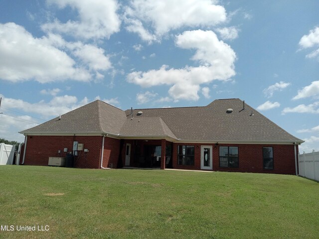 496 Cleveland Crossing Rd, Cleveland, MS 38732 - rear view of house featuring brick siding and a shingled roof