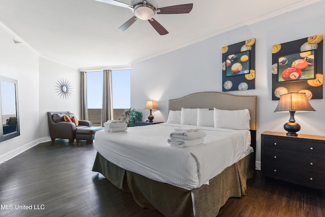 bedroom with ceiling fan, wood finished floors, baseboards, and ornamental molding