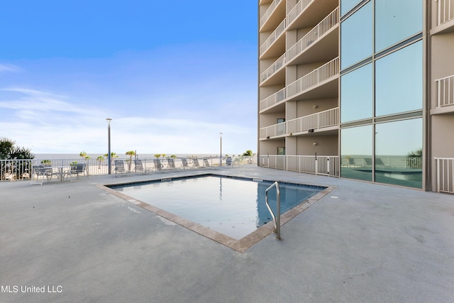 pool with a patio area