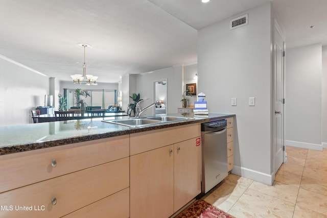 kitchen with visible vents, light tile patterned flooring, a sink, pendant lighting, and stainless steel dishwasher