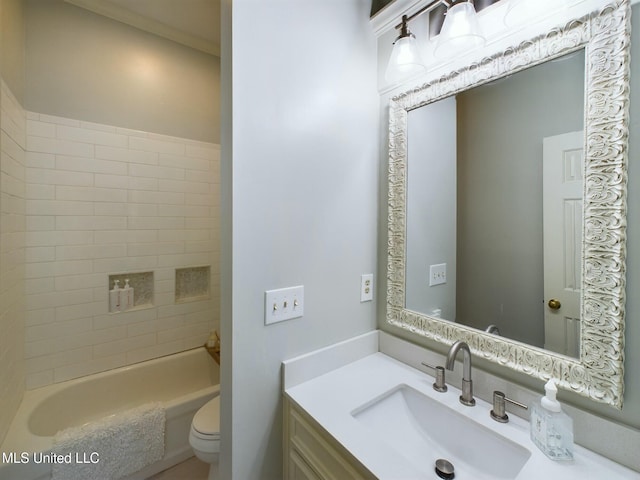 bathroom featuring toilet and vanity