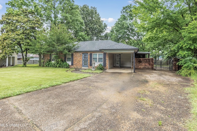 6830 Embassy Cir, Horn Lake, MS 38637 - single story home featuring driveway, a shingled roof, a carport, and brick siding