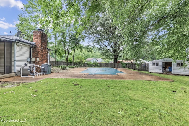 6830 Embassy Cir, Horn Lake, MS 38637 - view of yard featuring a patio area and an outbuilding