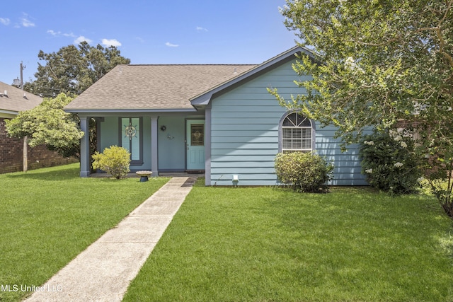172 Briarfield Ave, Biloxi, MS 39531 - view of front of house with a shingled roof, a front yard, and covered porch