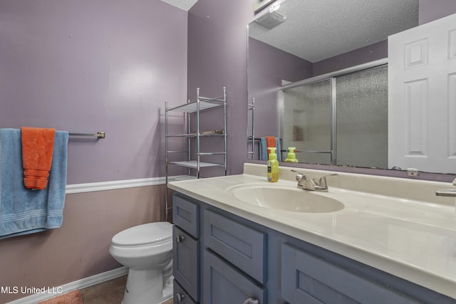 172 Briarfield Ave, Biloxi, MS 39531 - full bath featuring vanity, a shower stall, tile patterned floors, and a textured ceiling