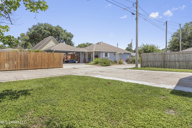 172 Briarfield Ave, Biloxi, MS 39531 - view of yard with concrete driveway and a carport