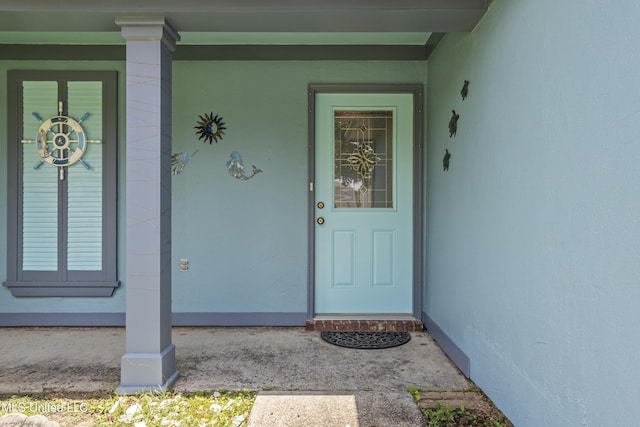 172 Briarfield Ave, Biloxi, MS 39531 - view of exterior entry featuring covered porch and stucco siding