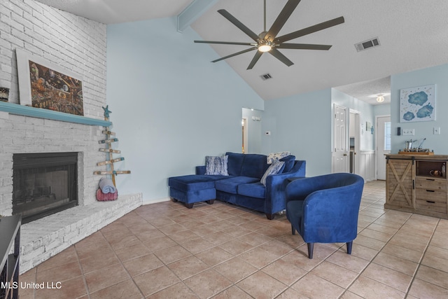 172 Briarfield Ave, Biloxi, MS 39531 - living room with a ceiling fan, high vaulted ceiling, beam ceiling, light tile patterned floors, and a brick fireplace