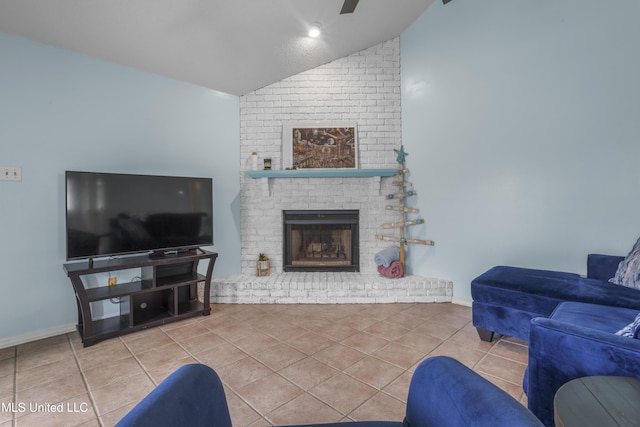 172 Briarfield Ave, Biloxi, MS 39531 - living room featuring vaulted ceiling, tile patterned flooring, a fireplace, and ceiling fan