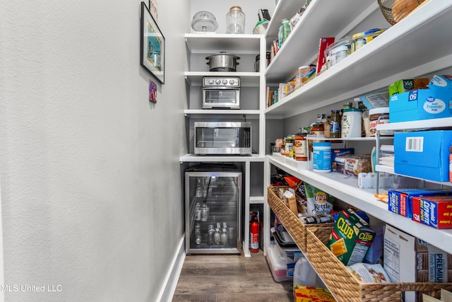 pantry with wine cooler