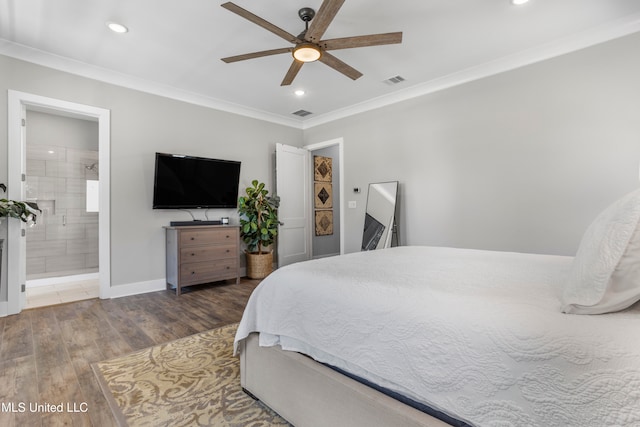 bedroom with ensuite bath, ceiling fan, crown molding, and dark hardwood / wood-style floors