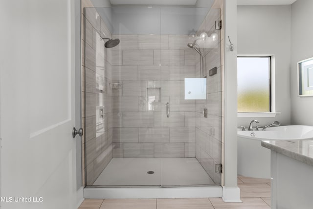 bathroom with vanity and an enclosed shower