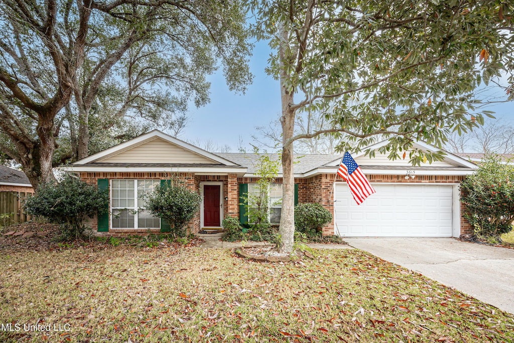 single story home with a garage